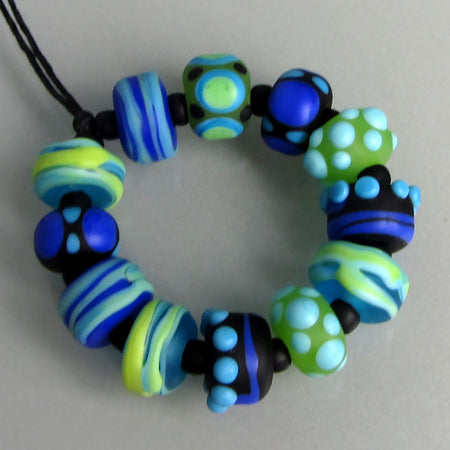Made to order ♥ 24 handcrafted Petrol/turquoise lampwork spacer glass beads ♥